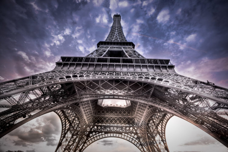 I went under the Eiffel tower and we had a very nice sky, with a wide angle lens, I got this shot. Loved the sky that end of afternoon