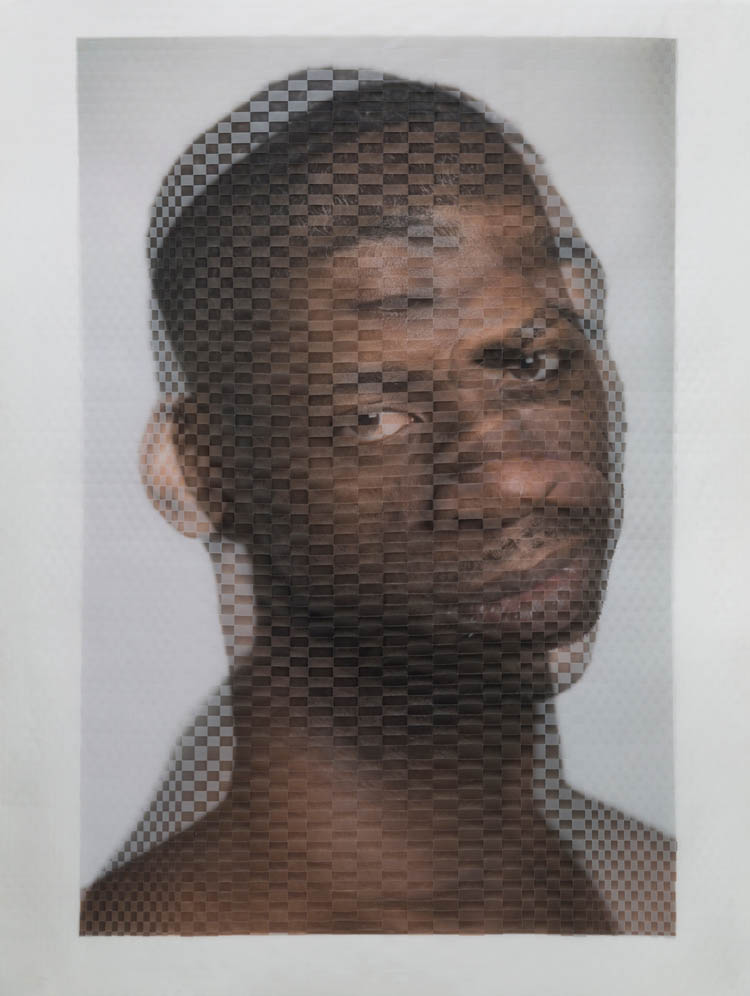 Each piece in the series results from Stern’s unique process of physically weaving together two large-format portrait photographs printed on translucent vellum. Stern captures the original images digitally in a lighting studio in Brooklyn, and cuts and weaves by hand. The resulting “woven portraits” are at once physical objects and rhythmic abstractions of their subjects. THIS PIECE MEASURES 40.25” x 30.5”