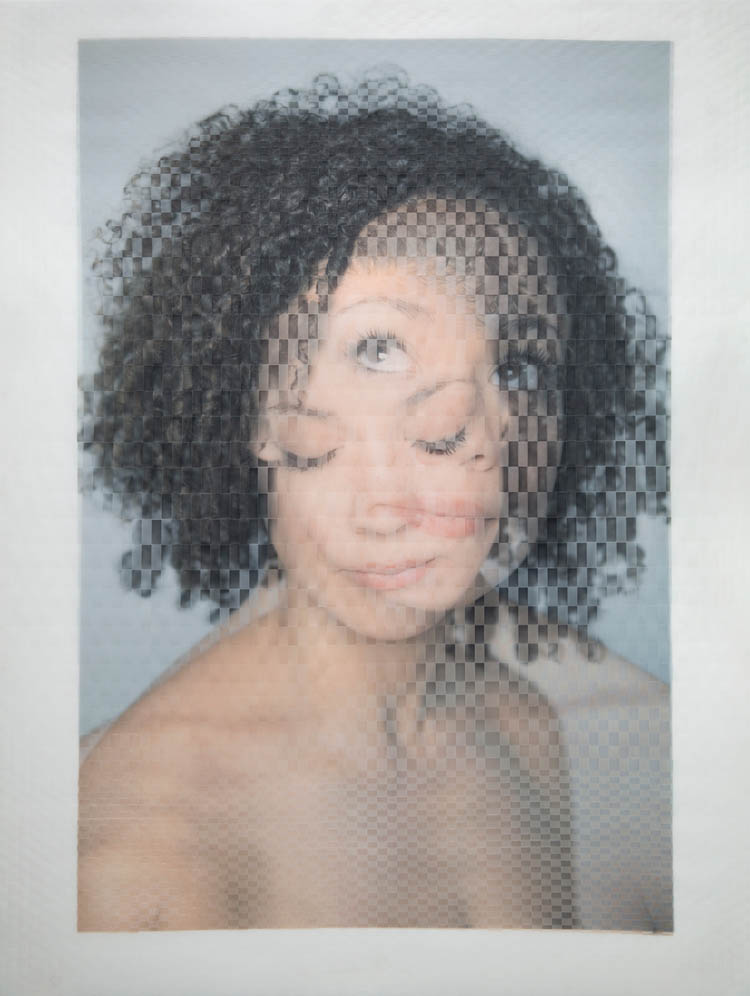 Each piece in the series results from Stern’s unique process of physically weaving together two large-format portrait photographs printed on translucent vellum. Stern captures the original images digitally in a lighting studio in Brooklyn, and cuts and weaves by hand. The resulting “woven portraits” are at once physical objects and rhythmic abstractions of their subjects. THIS PIECE MEASURES 40.5” x 30.5”